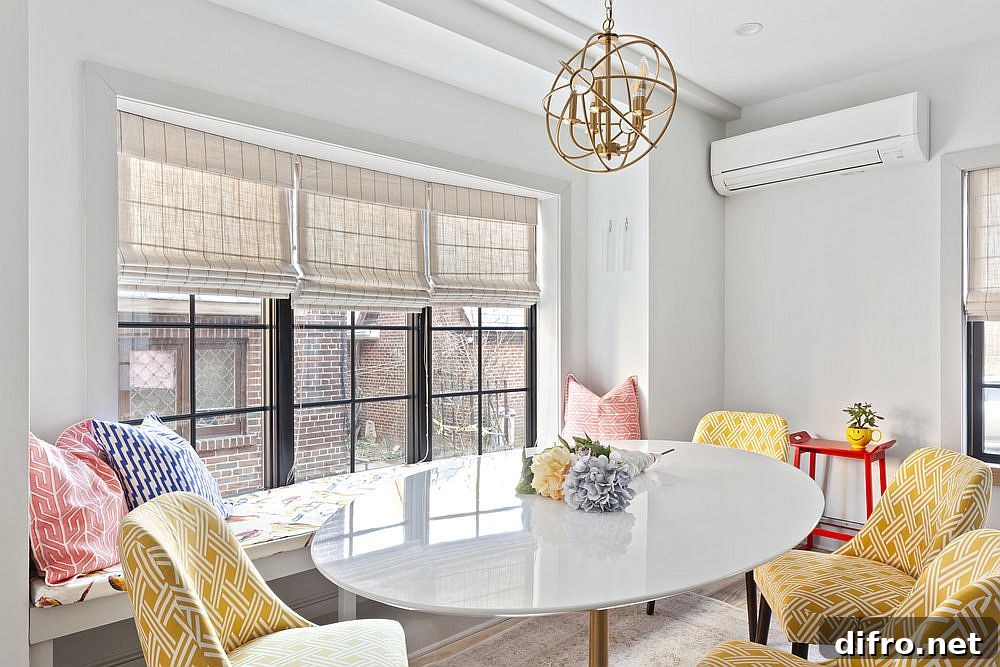 Corner banquette dining area with yellow chairs