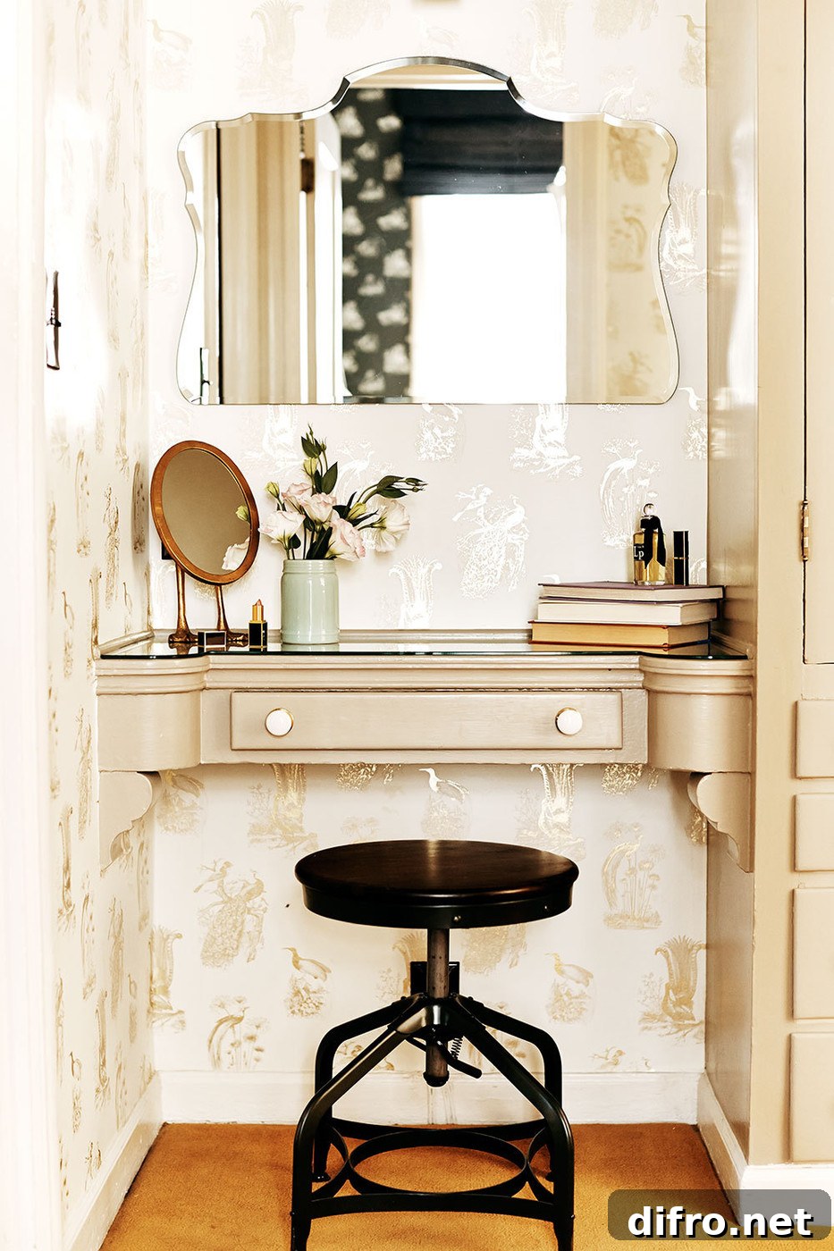 Vanity area with gilded wallpaper