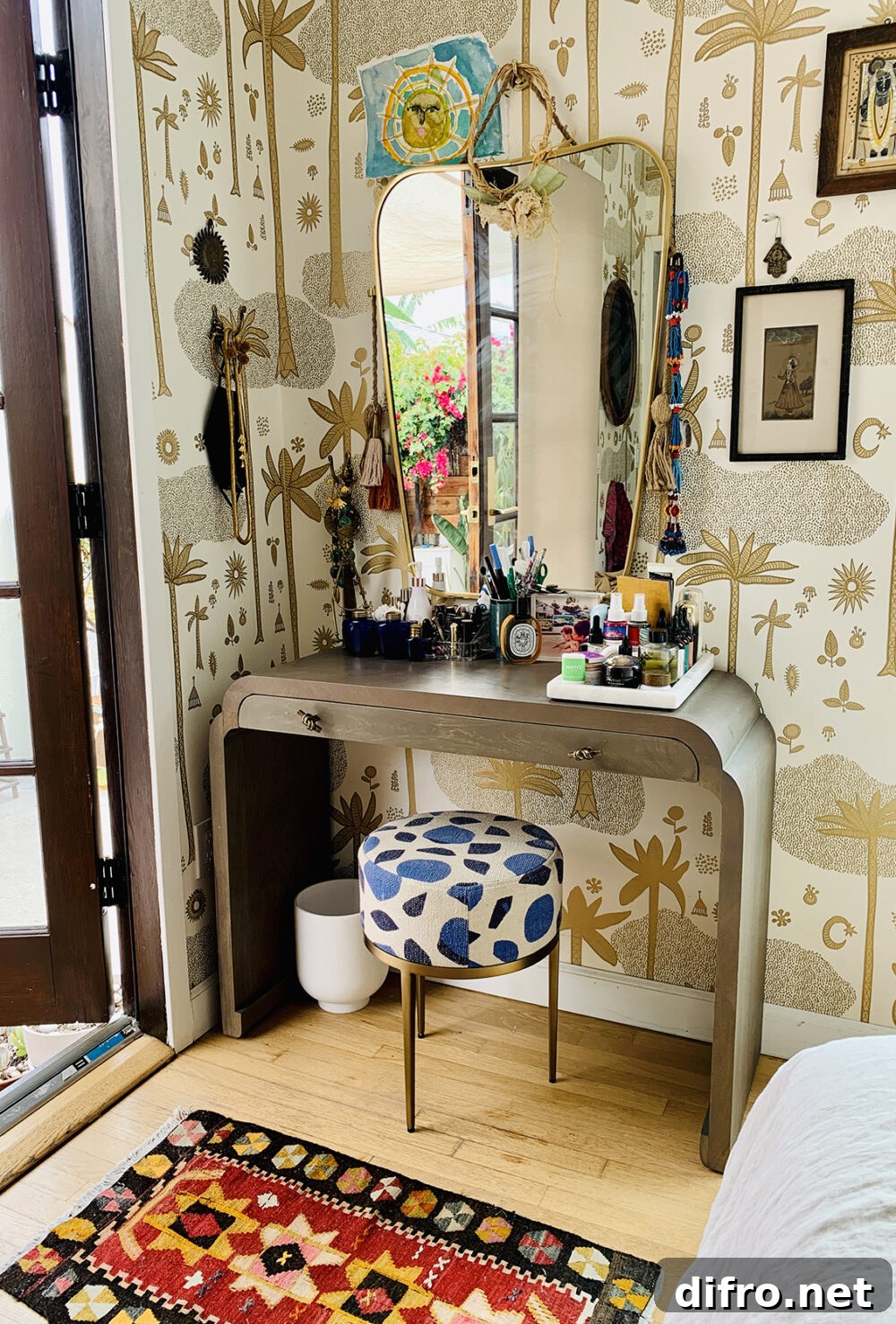 Vanity area styled with patterned stool and art