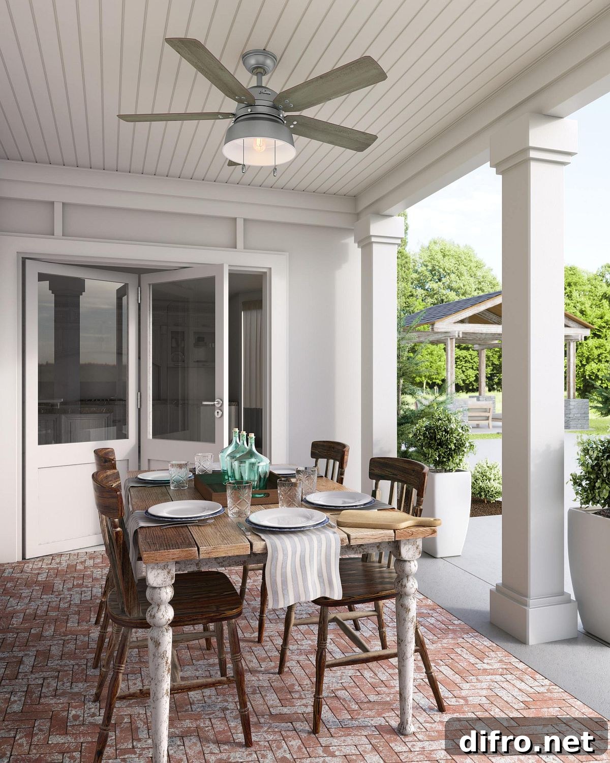 Small porch dining area with terracotta chevron floor