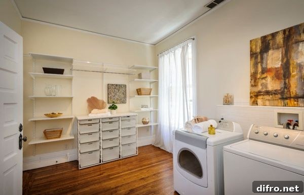 Freestanding shelves in the laundry room offer design flexibility