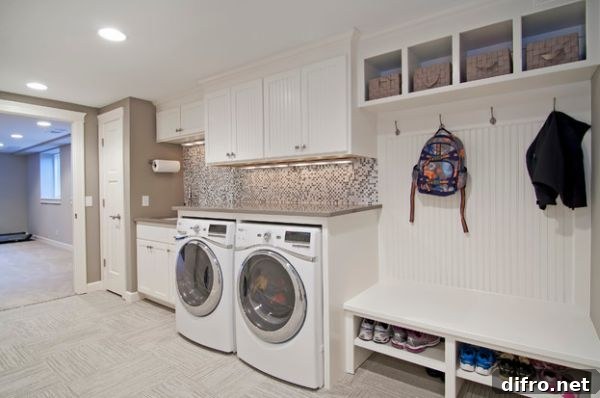 Mud room and laundry combo with a lovely back-splash and cool shelves