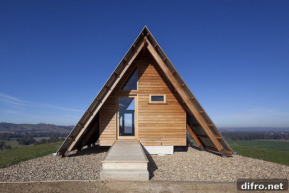 Wooden exterior and A-frame form of JR's Hut