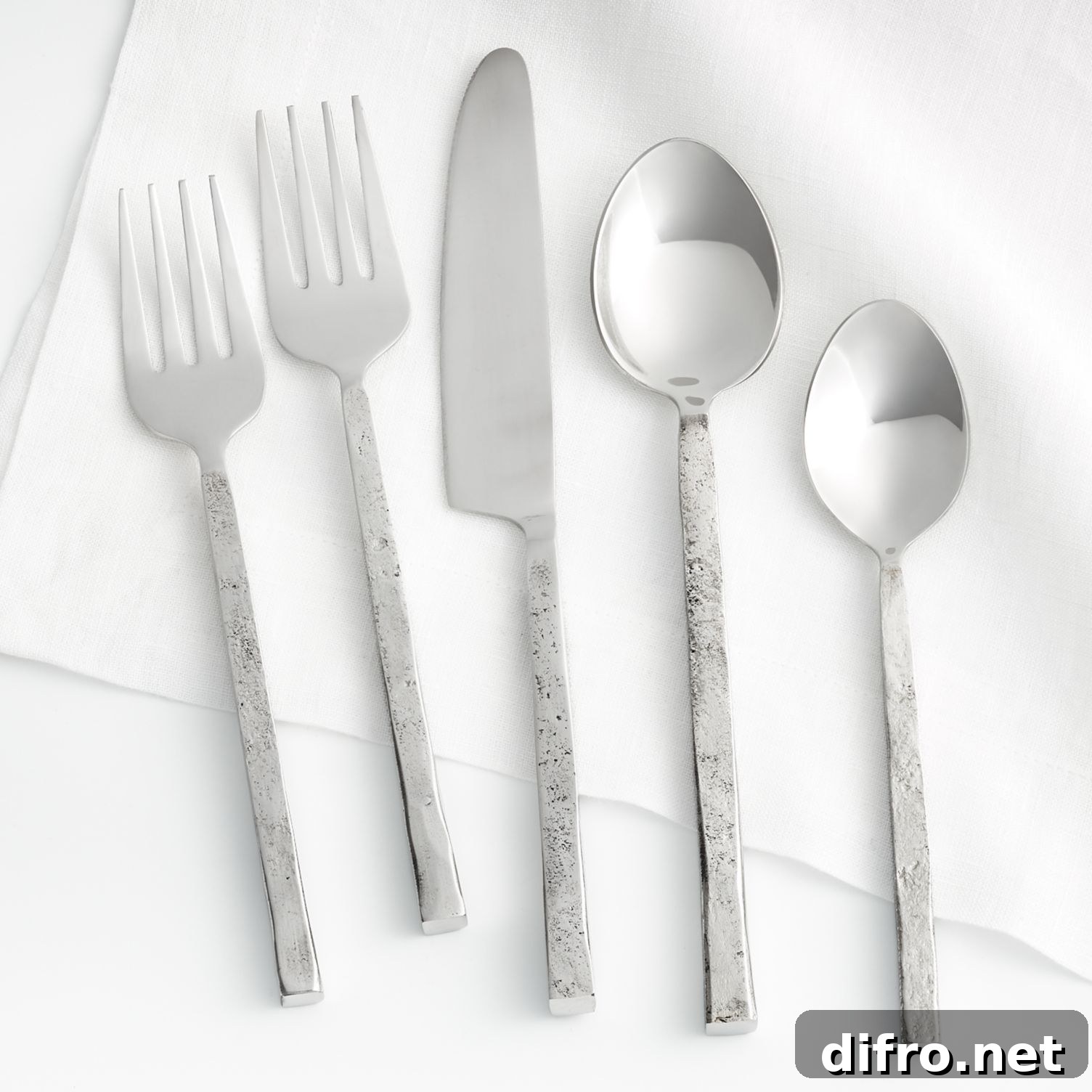 Rustic flatware with hand-forged handles