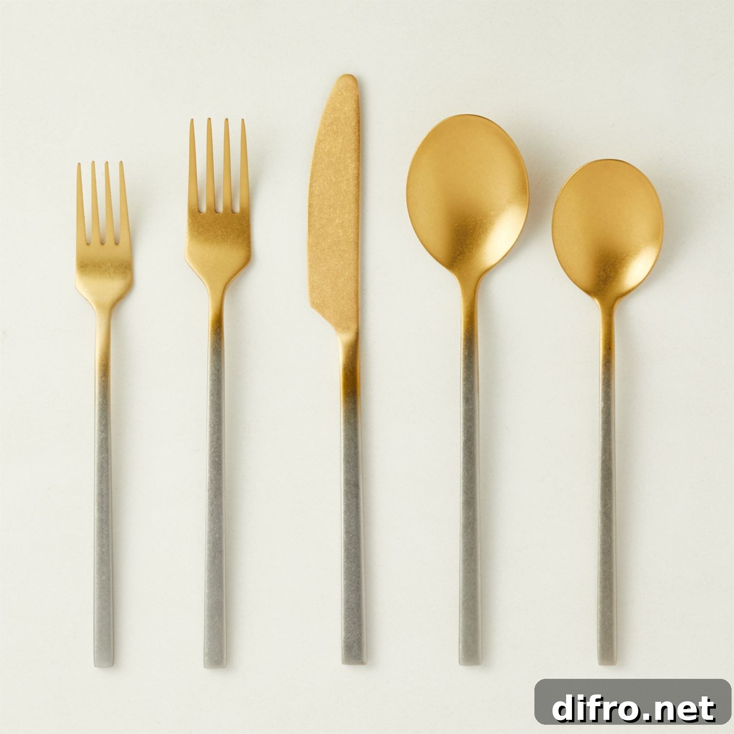 Gold and silver flatware set with faded effect