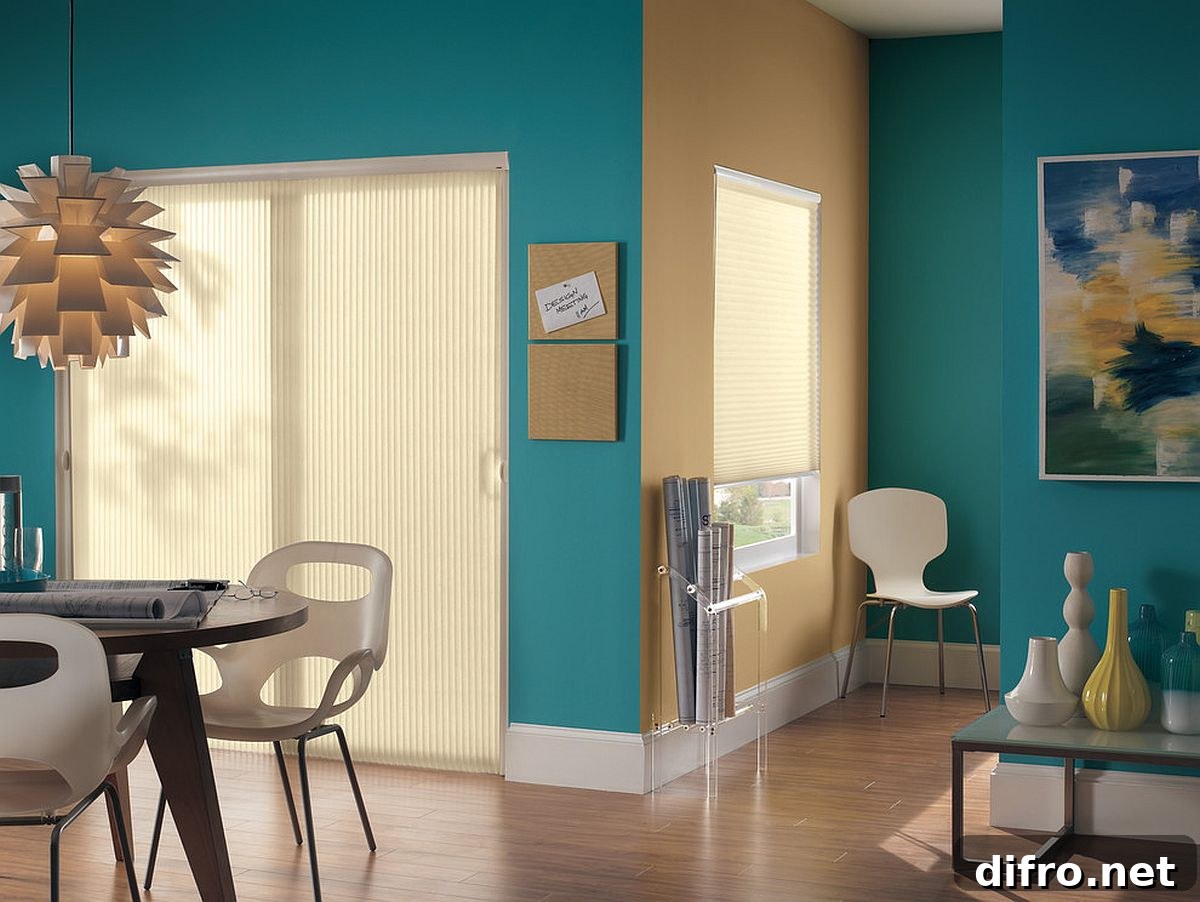 Turquoise backdrop linking kitchen and dining room