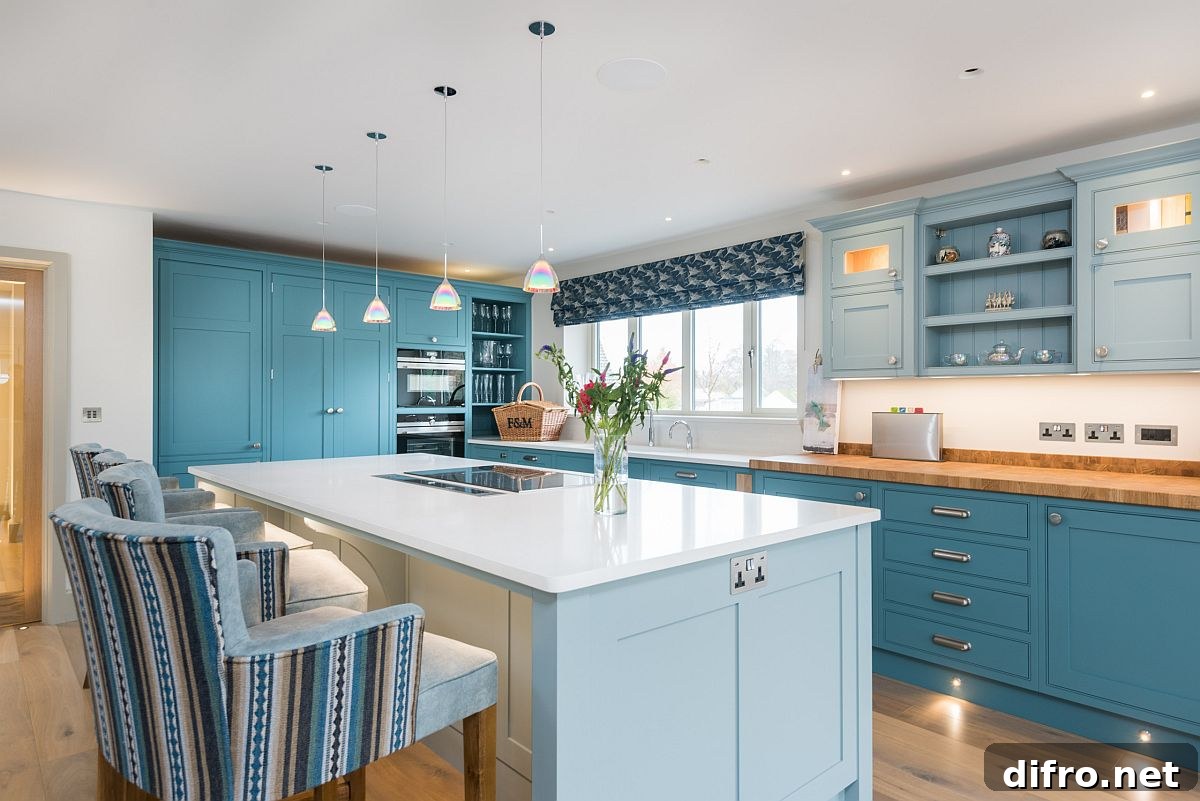 Beach style kitchen in varied blue shades