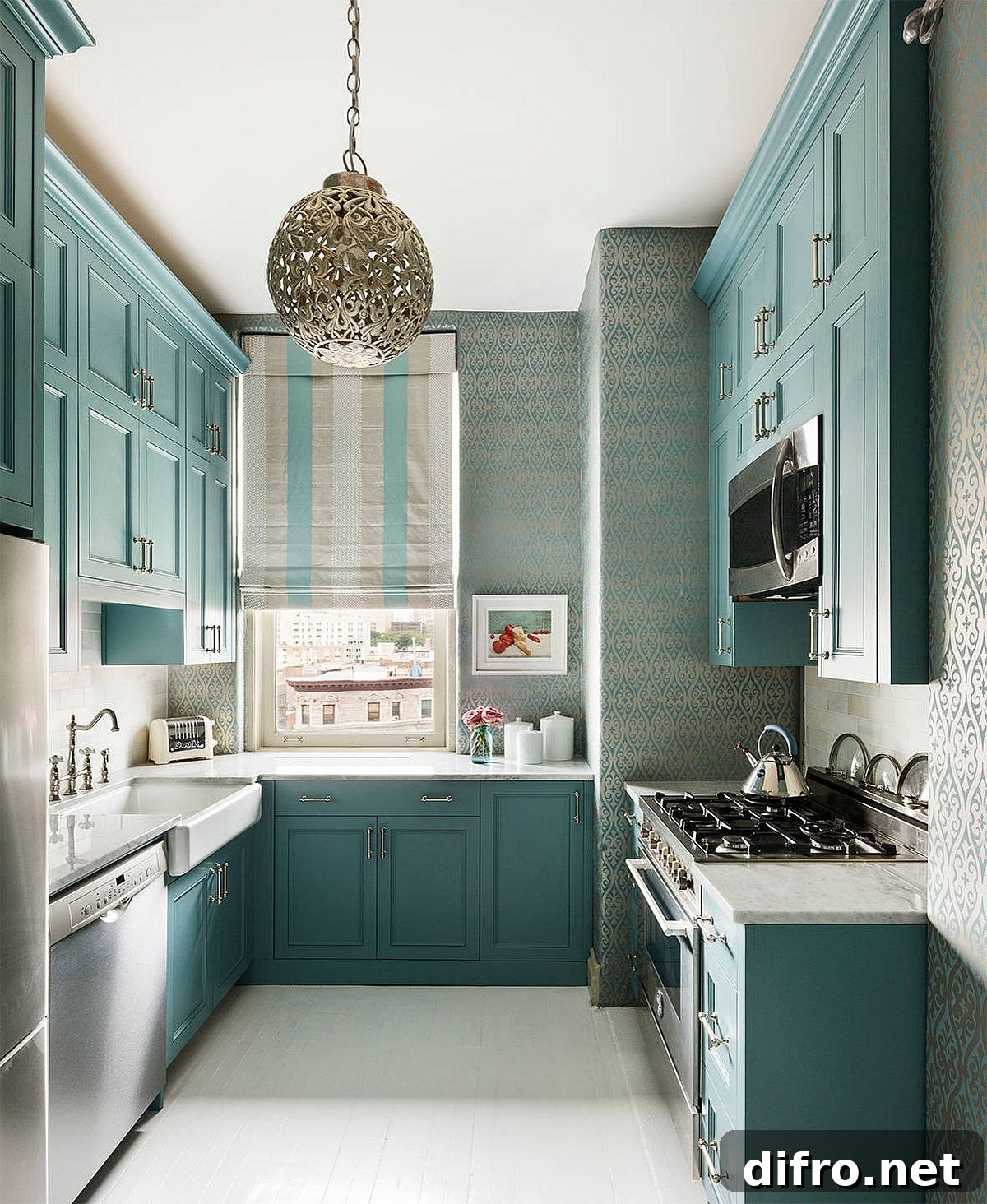 Light turquoise cabinets with patterned backsplash