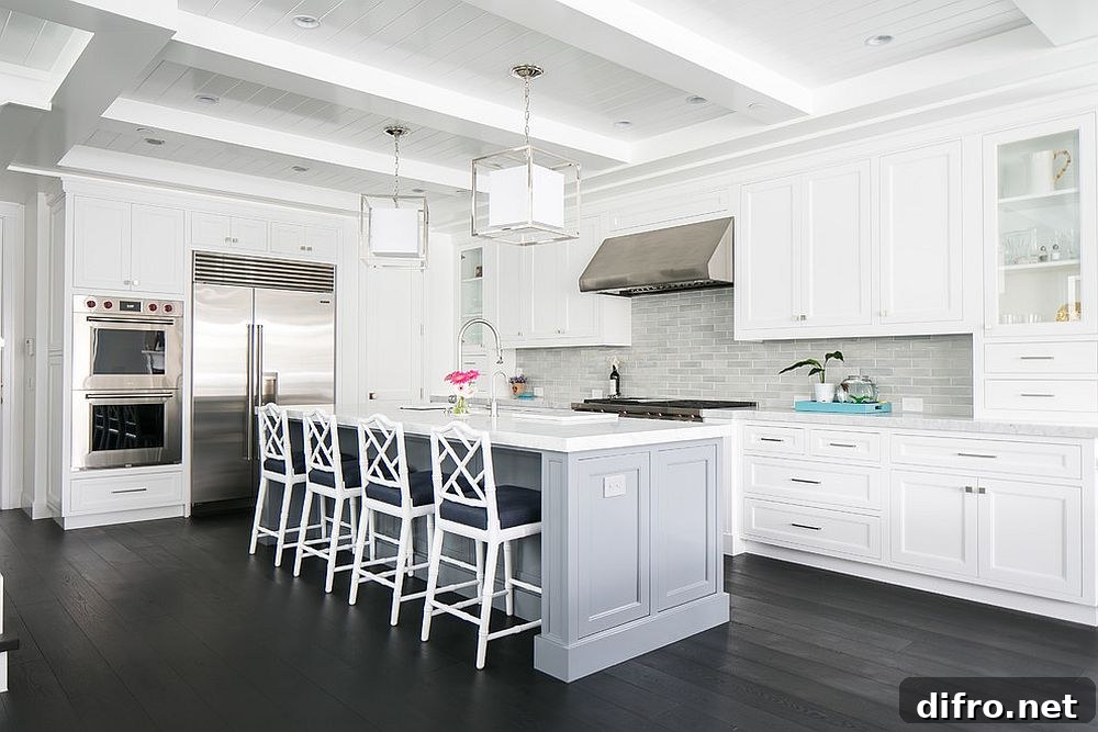 Gray tile and flooring accent in a white kitchen