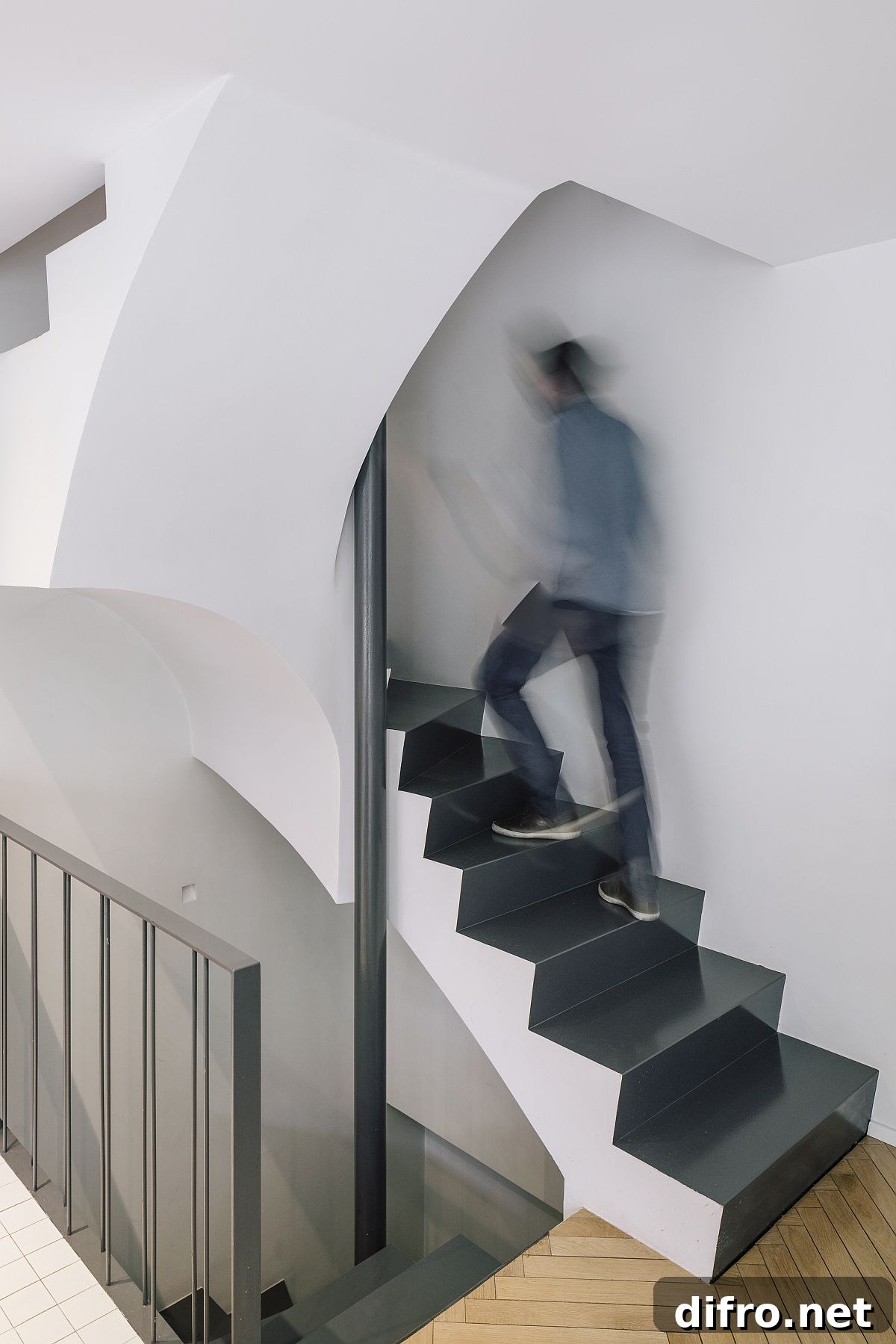 Contemporary staircase connecting different levels of the modern Madrid home