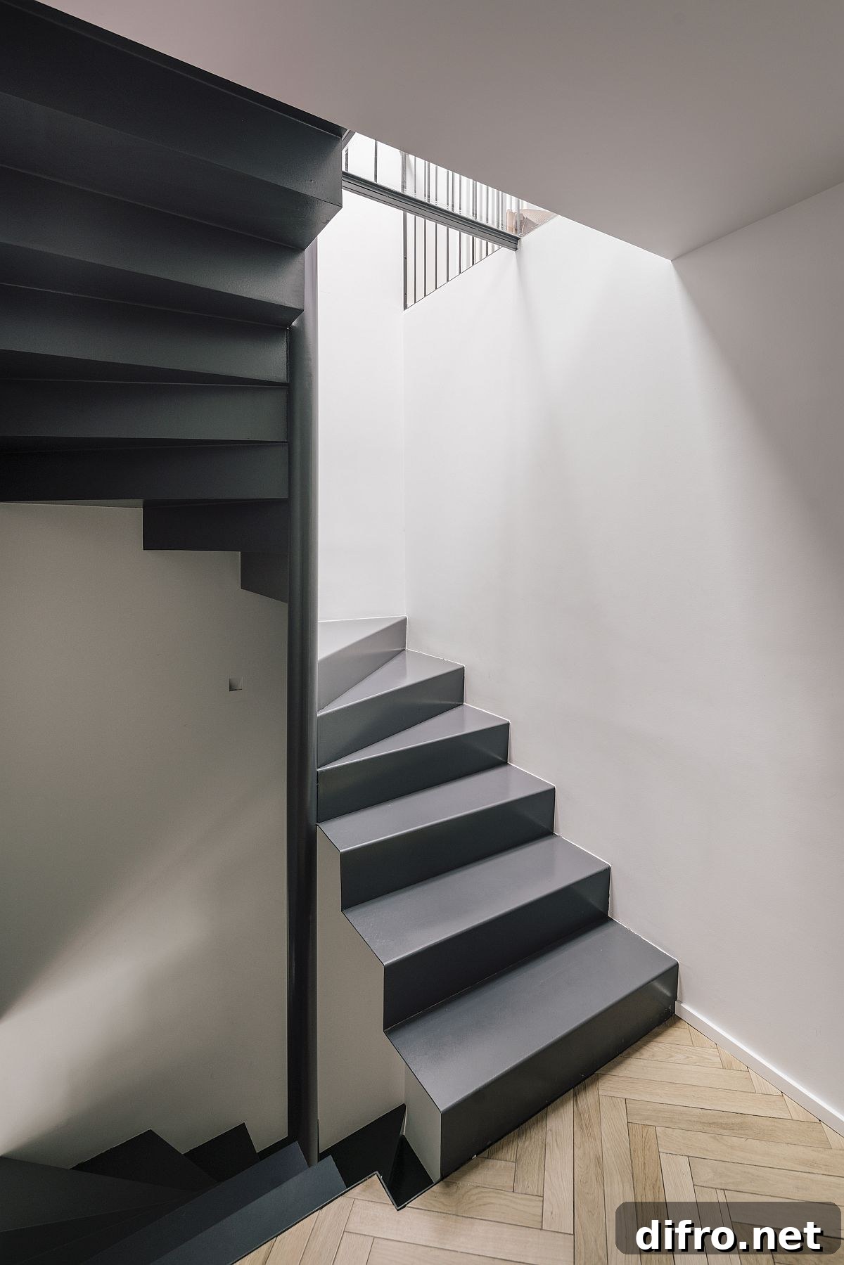 Natural light illuminates the staircase and different levels inside the house