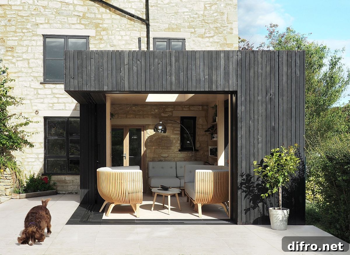 Reading room extension opening onto garden