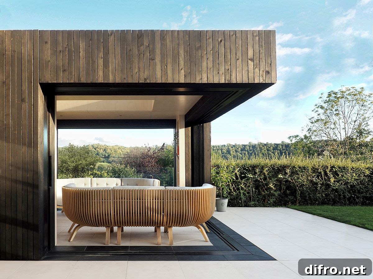 Glass walls and doors opening to the garden