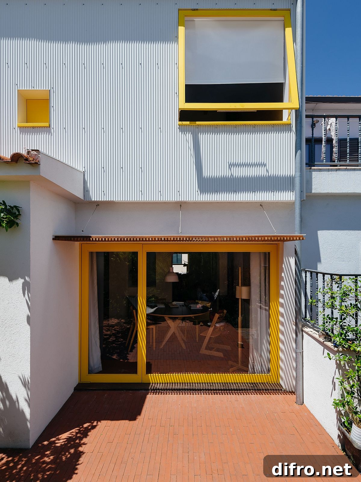 Backyard connected with interior via sliding glass doors