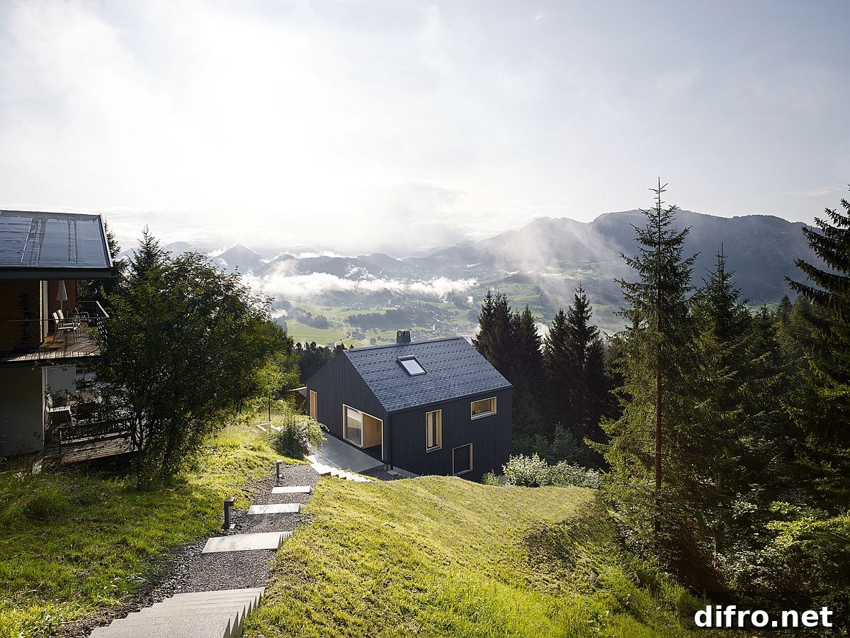 Seventy steps lead down to the holiday house on a sloped lot