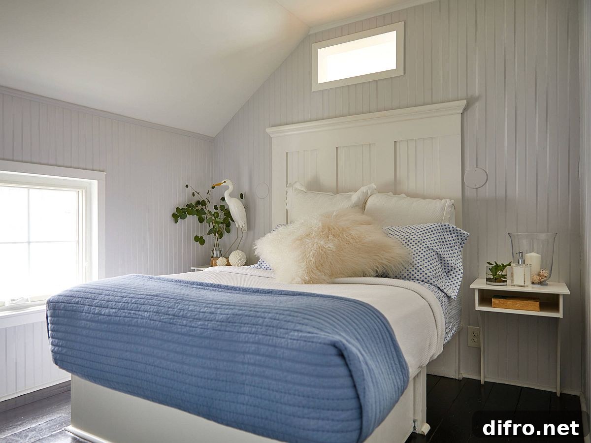 Black painted floor in modern coastal bedroom