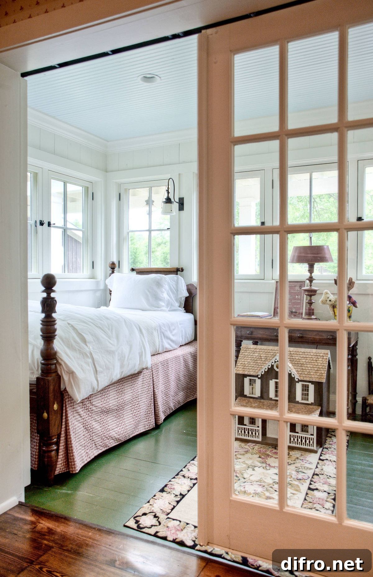 Farmhouse bedroom with green painted floor
