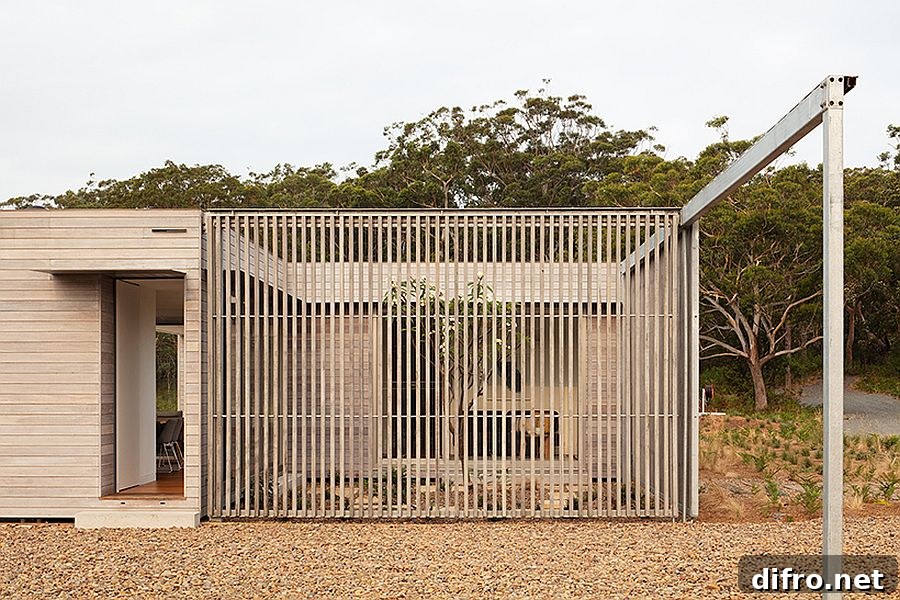 Dynamic design of the courtyard with sliding wooden door that opens the outdoors inside