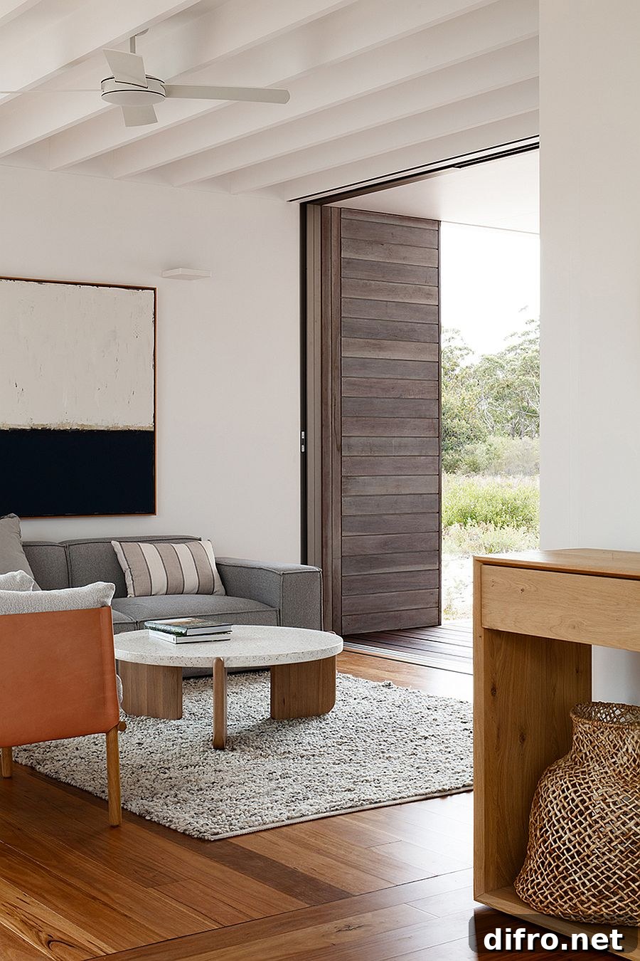 Furniture inside the house adds to the white and wood color scheme that is mostly neutral
