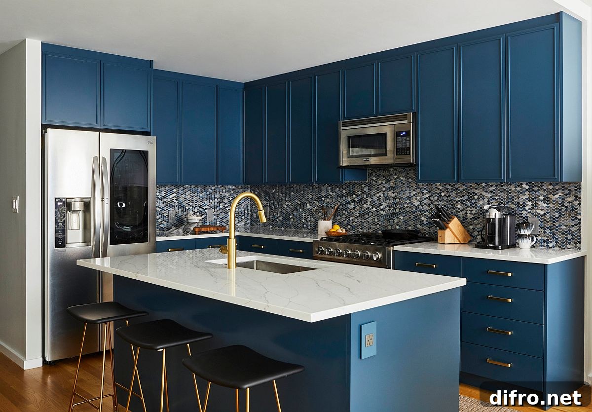 Small contemporary kitchen with dark blue cabinets