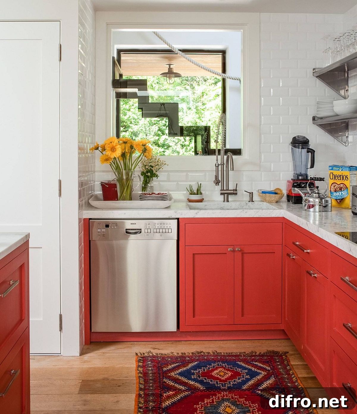 Beach style kitchen with orangey-red cabinets