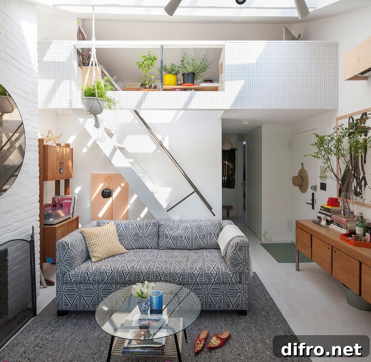 Small well-lit living room with a patterned small couch