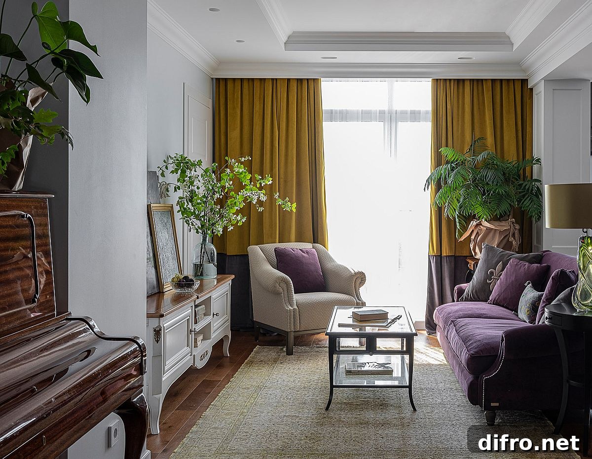 Traditional small living room with a bold purple couch and yellow drapes