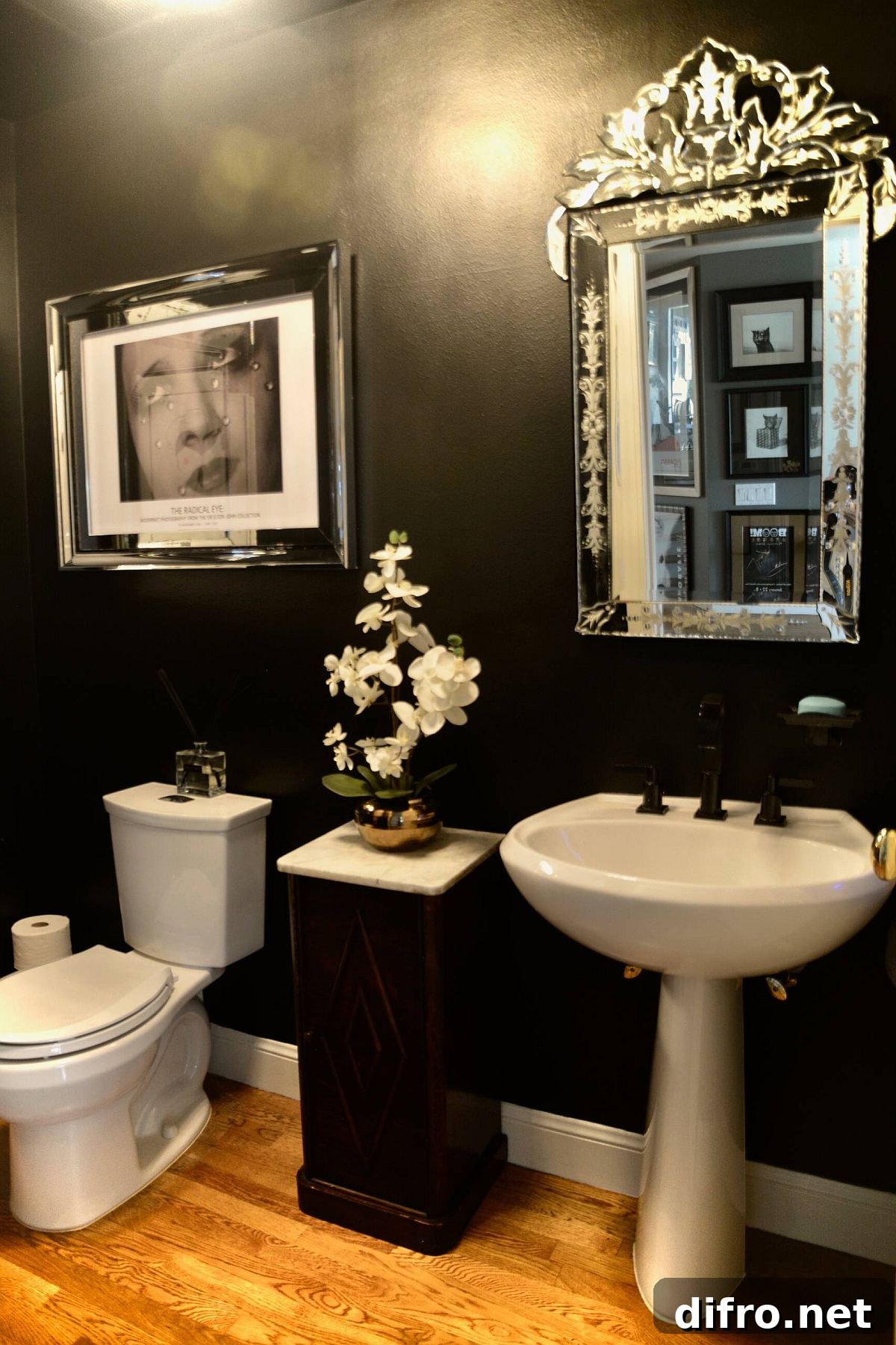 Black powder room with classic charm