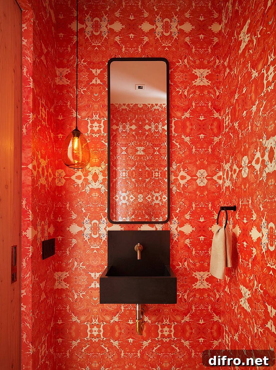 Powder room with brick red wallpaper