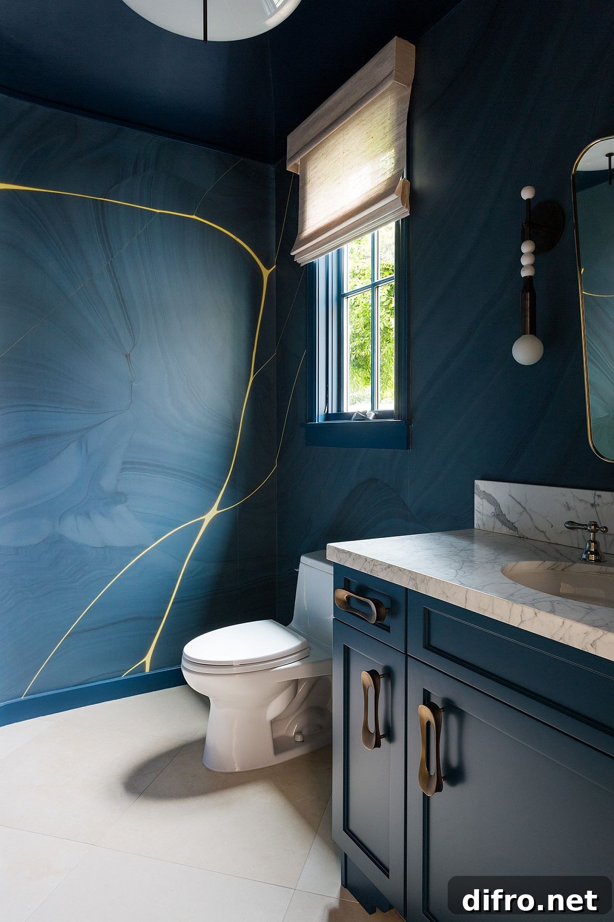 Blue patterned wallpaper in a modern powder room
