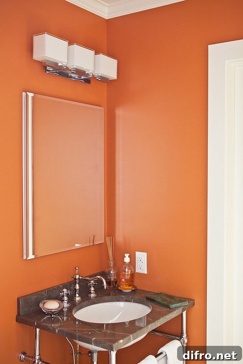 Orange and white powder room