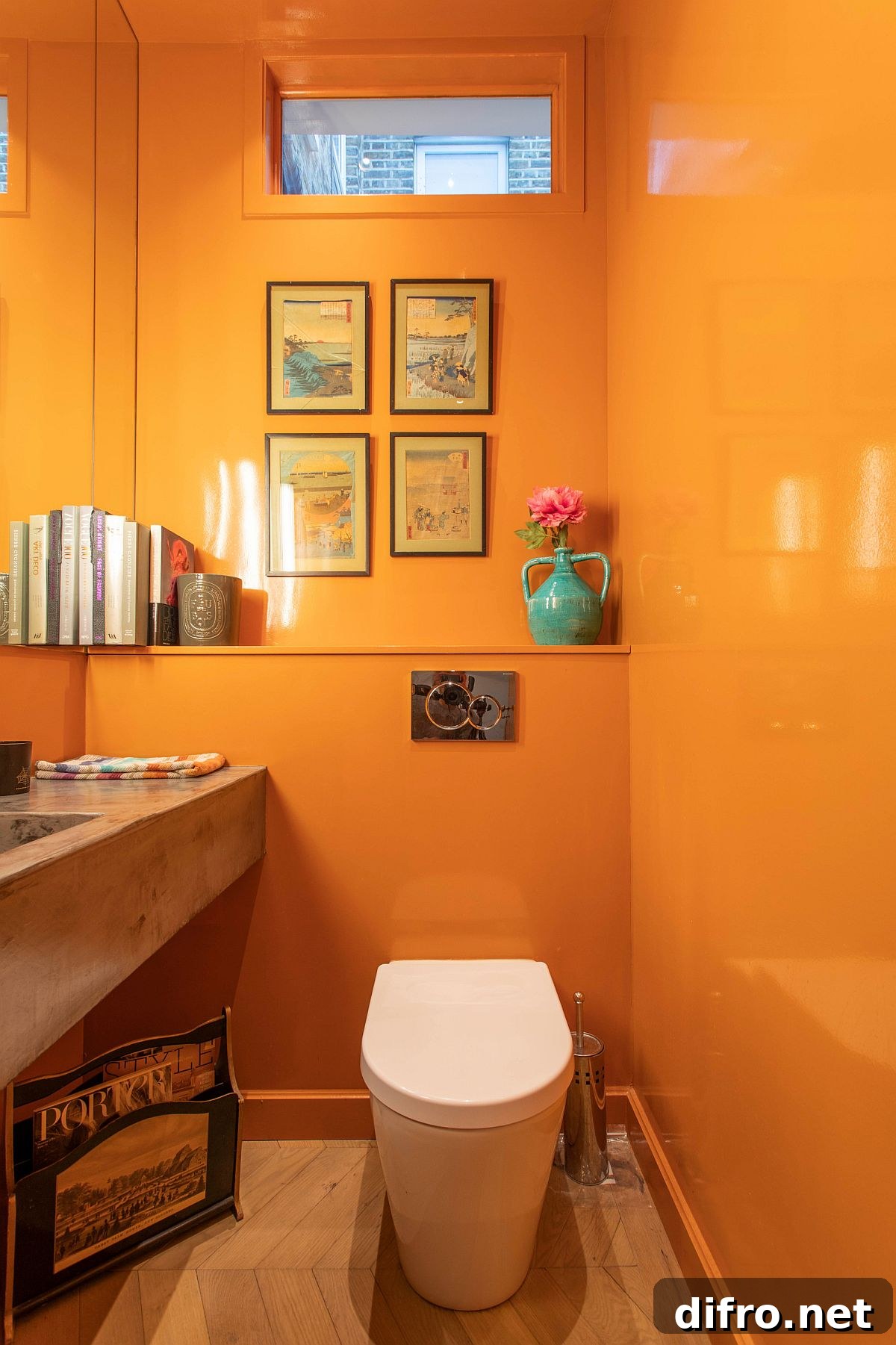 Glossy orange walls with wooden vanity