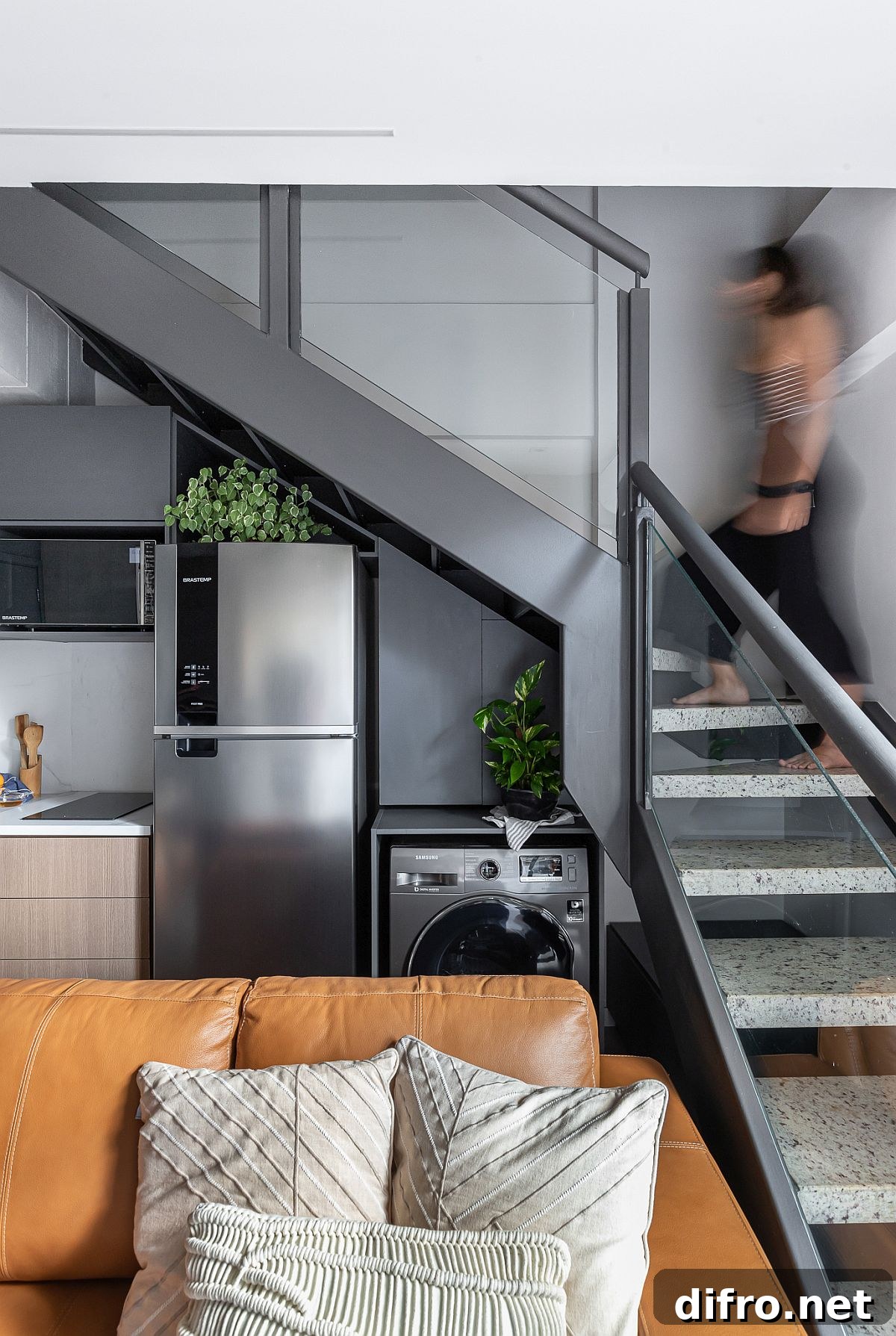 Remodeled staircase painted gray to match the loft’s style