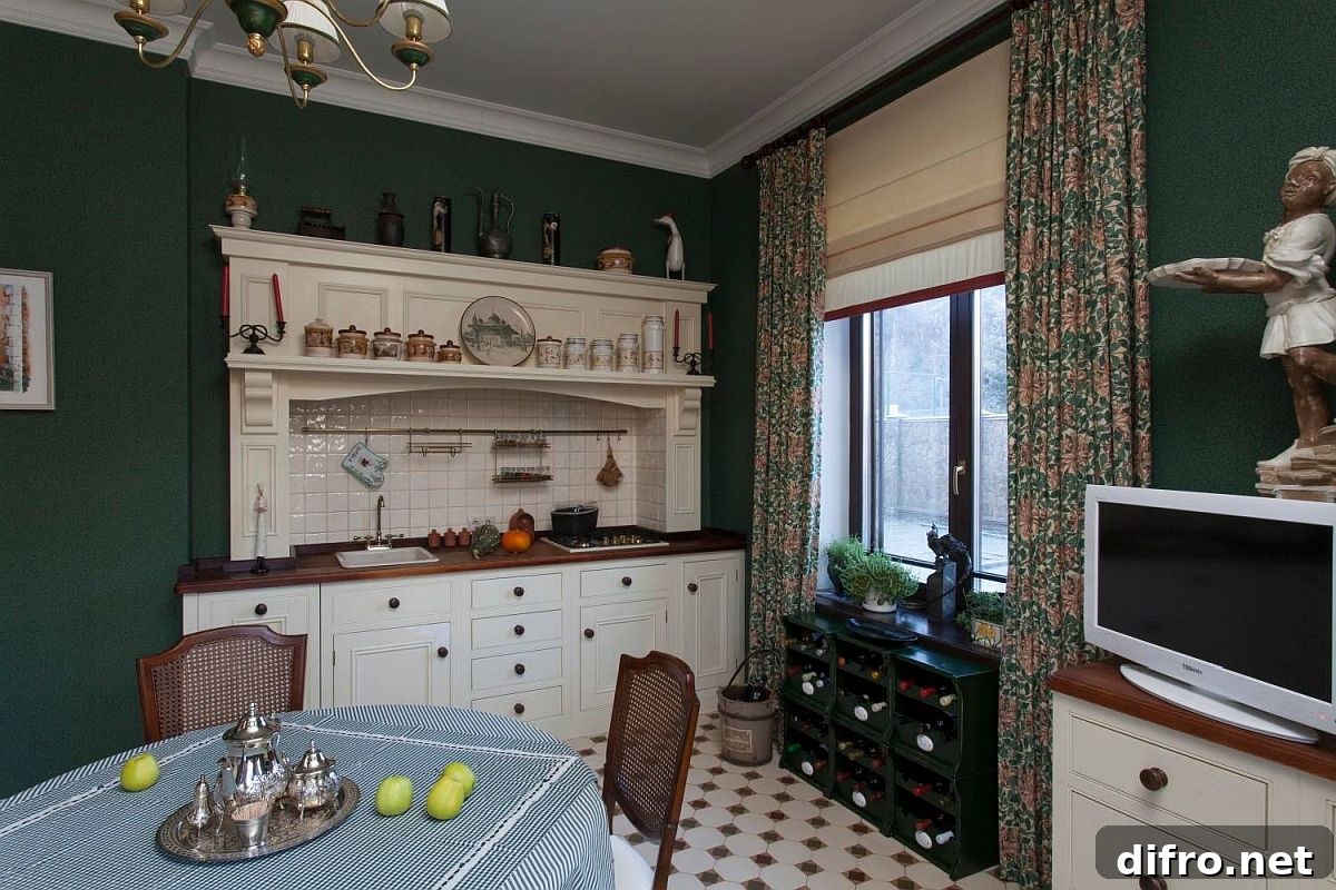 Dark green walls provide a striking backdrop for a Victorian kitchen