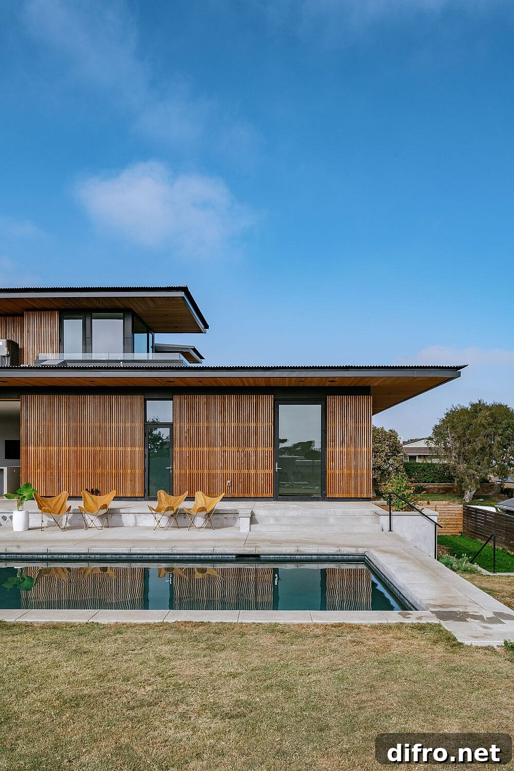 Pool and deck connected to the interior by sliding glass doors