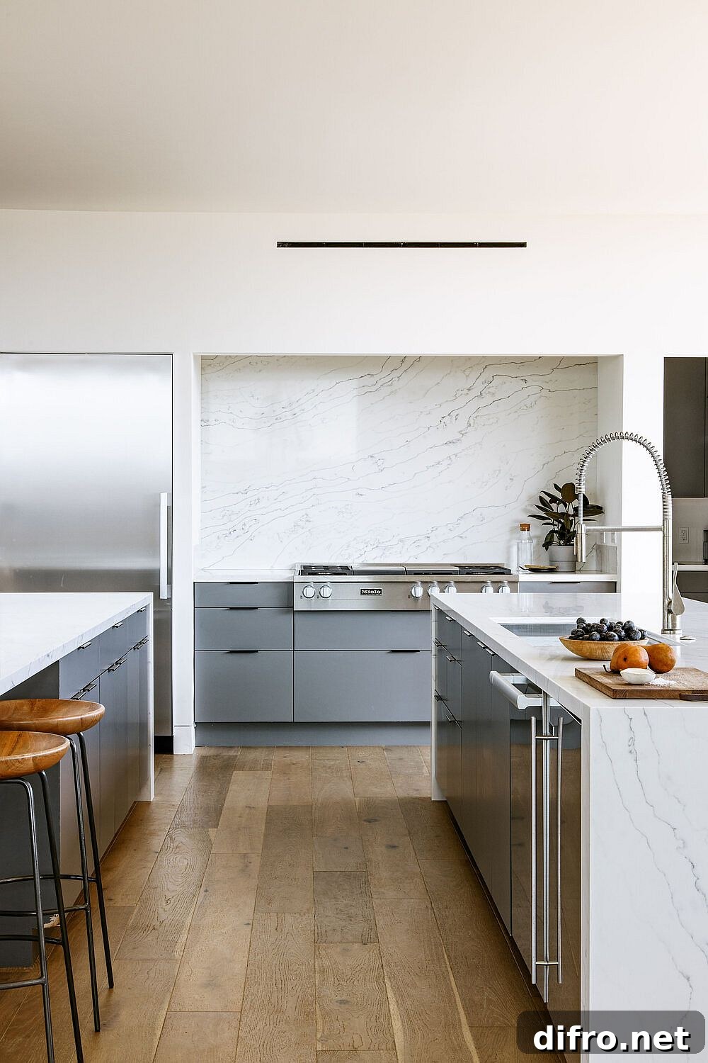 Kitchen with light bluish-gray cabinets
