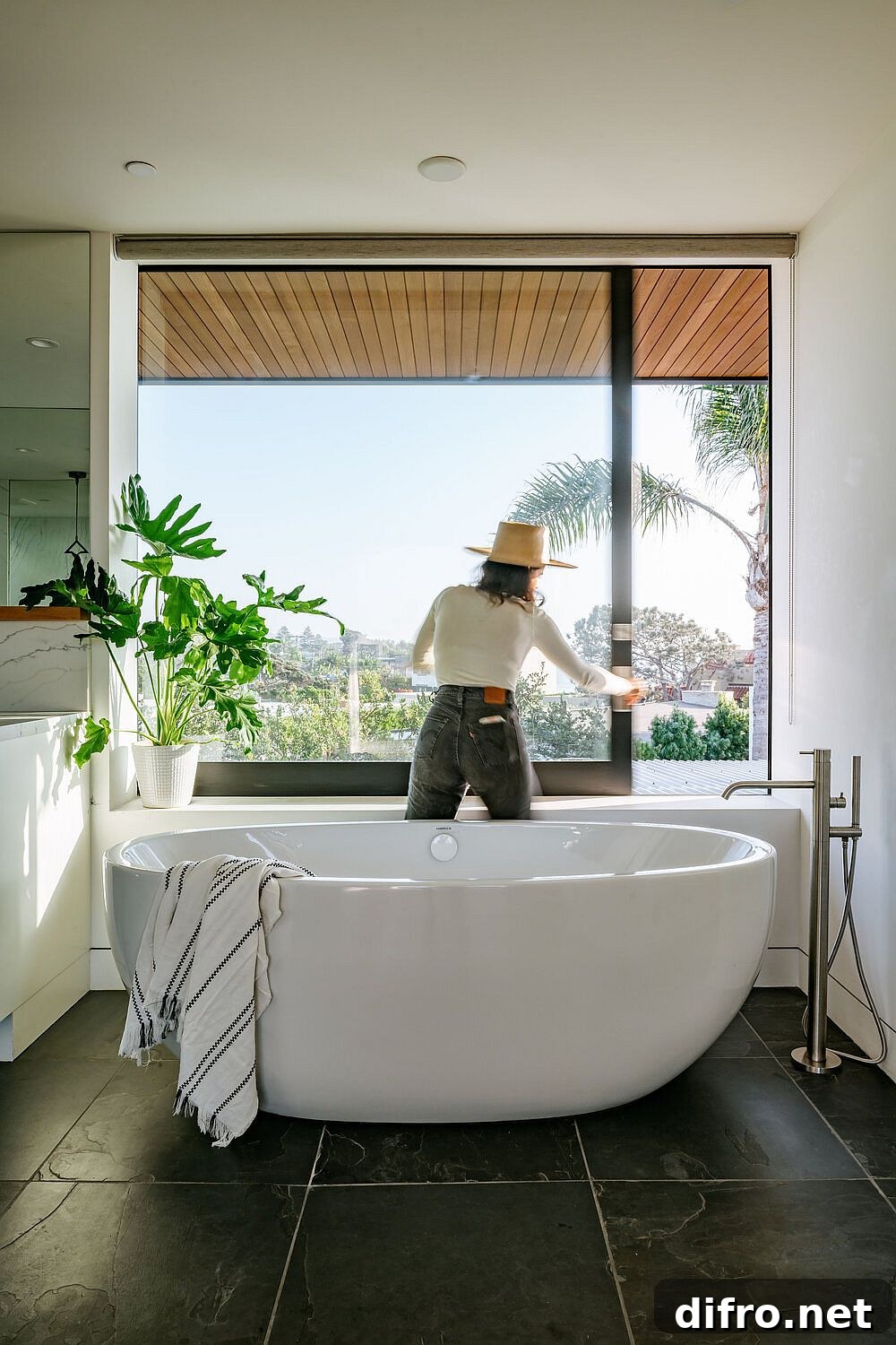 Spacious bathroom with a freestanding bathtub