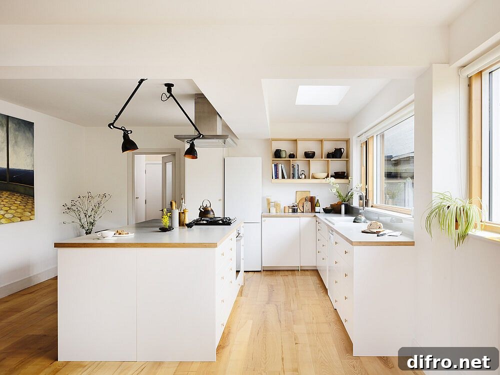 Skylight and sconce lights in kitchen