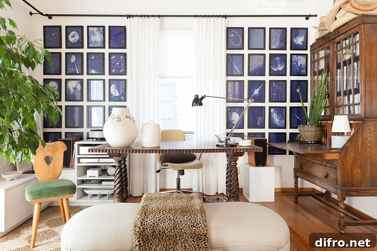 Framed astronomy-themed artwork above a home office desk