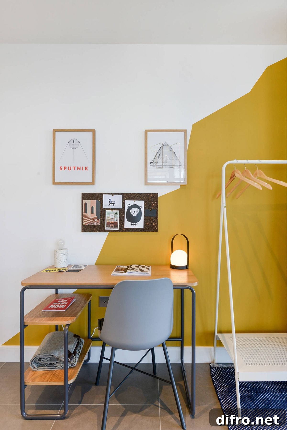 Modern eclectic home office with a white and yellow backdrop