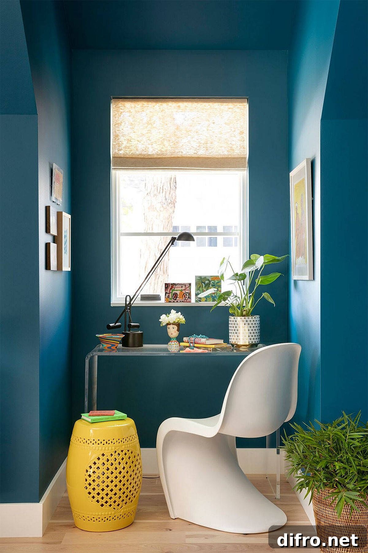 Blue eclectic home office with a touch of yellow