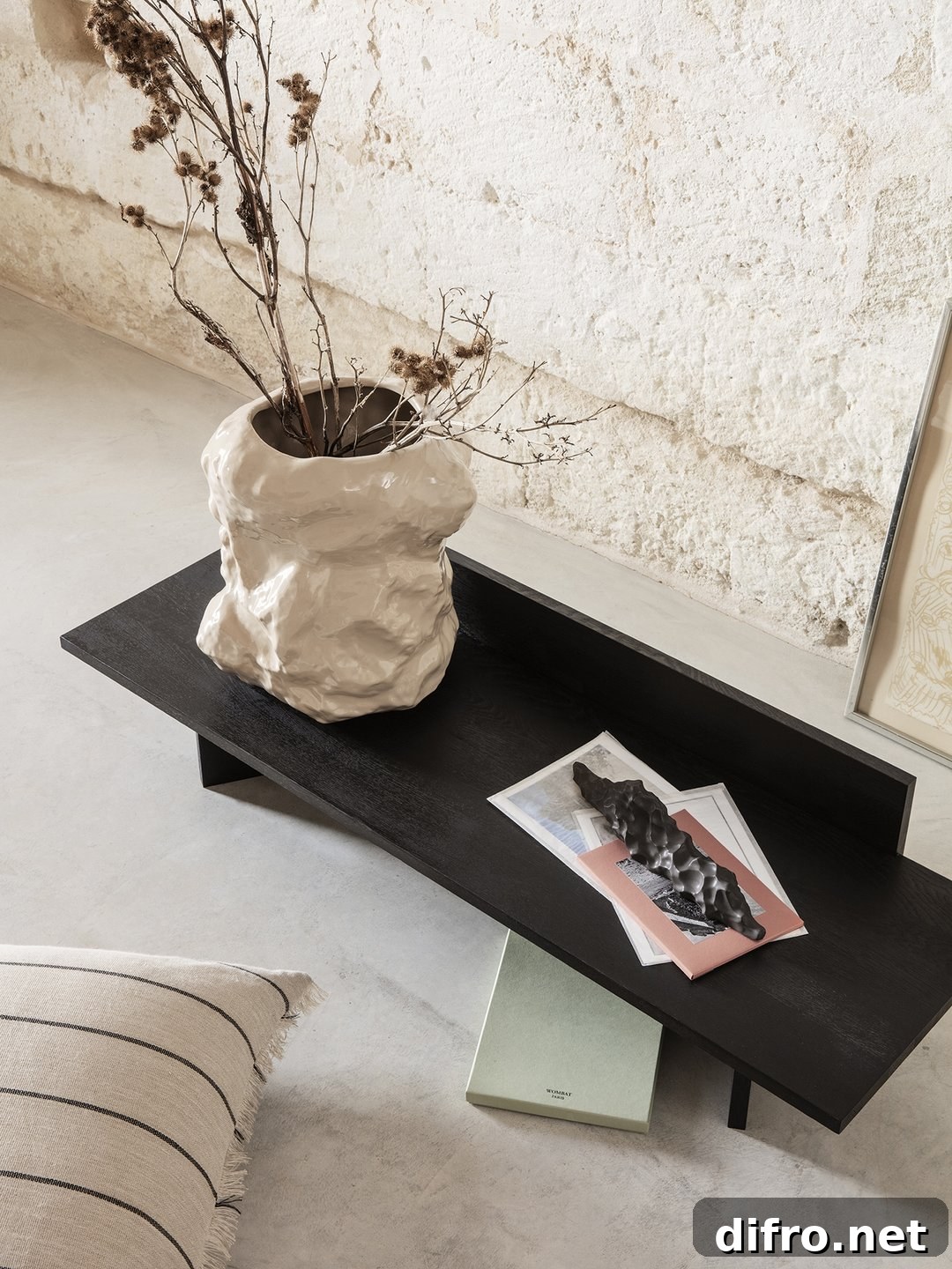 Low black ceramic sculpture