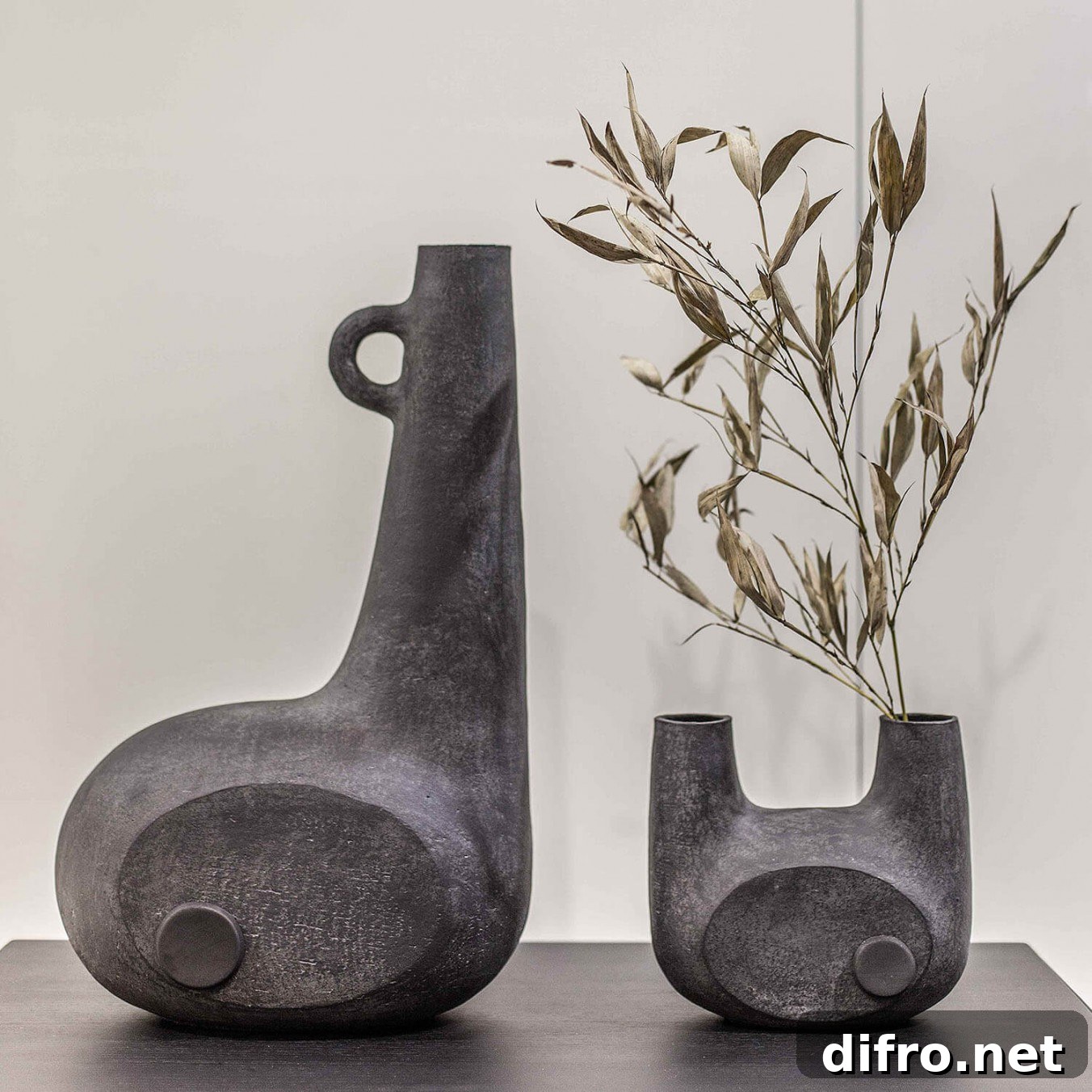 Black sculptural vases for contrast