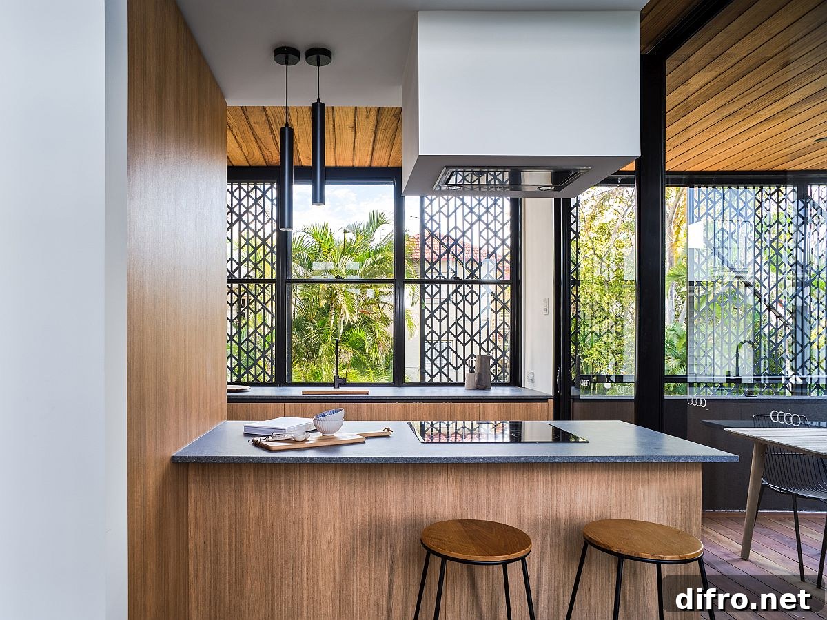 Compact kitchen with twin counters and natural ventilation