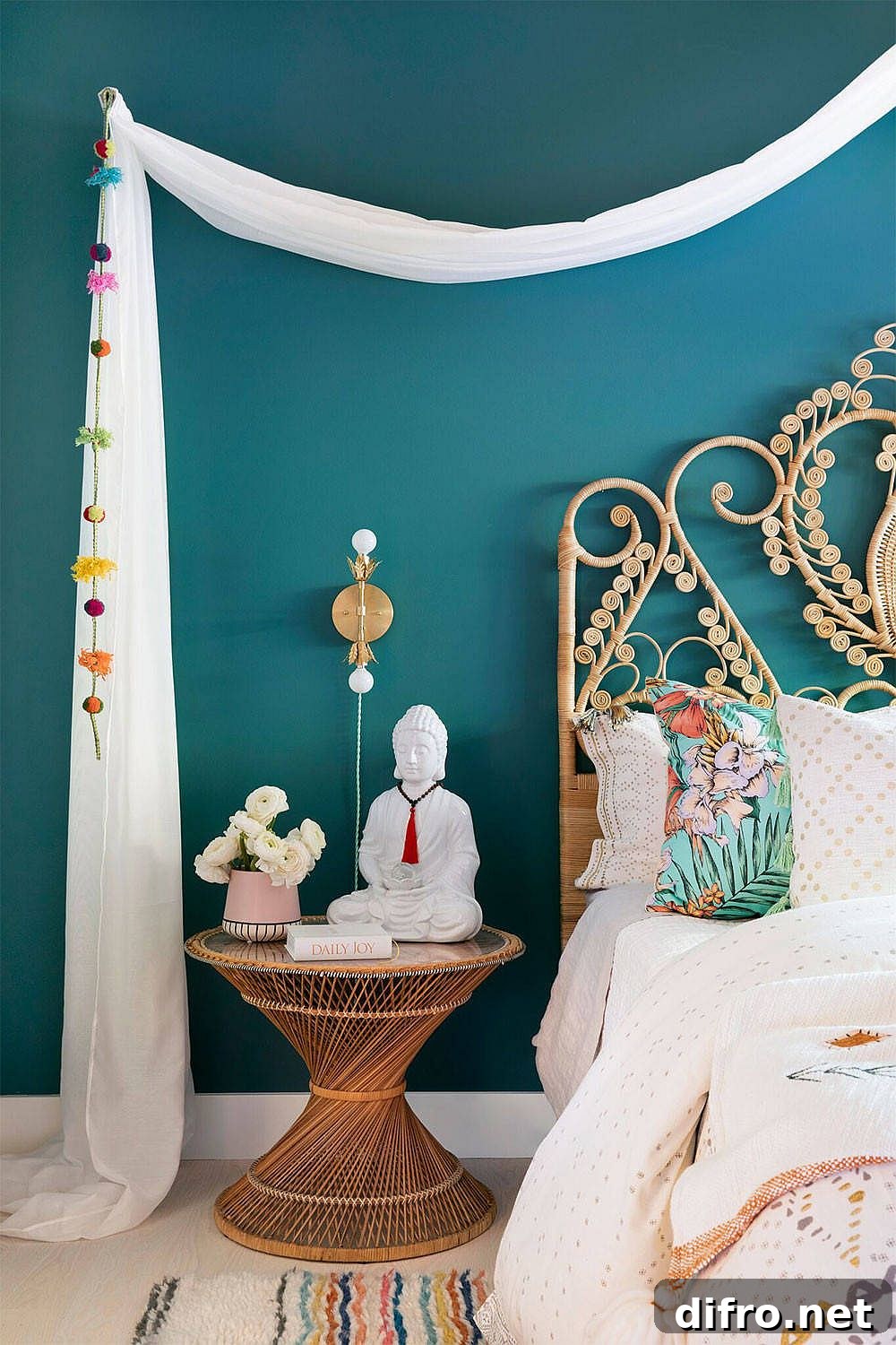 Bohemian-styled bedroom with teal painted walls.
