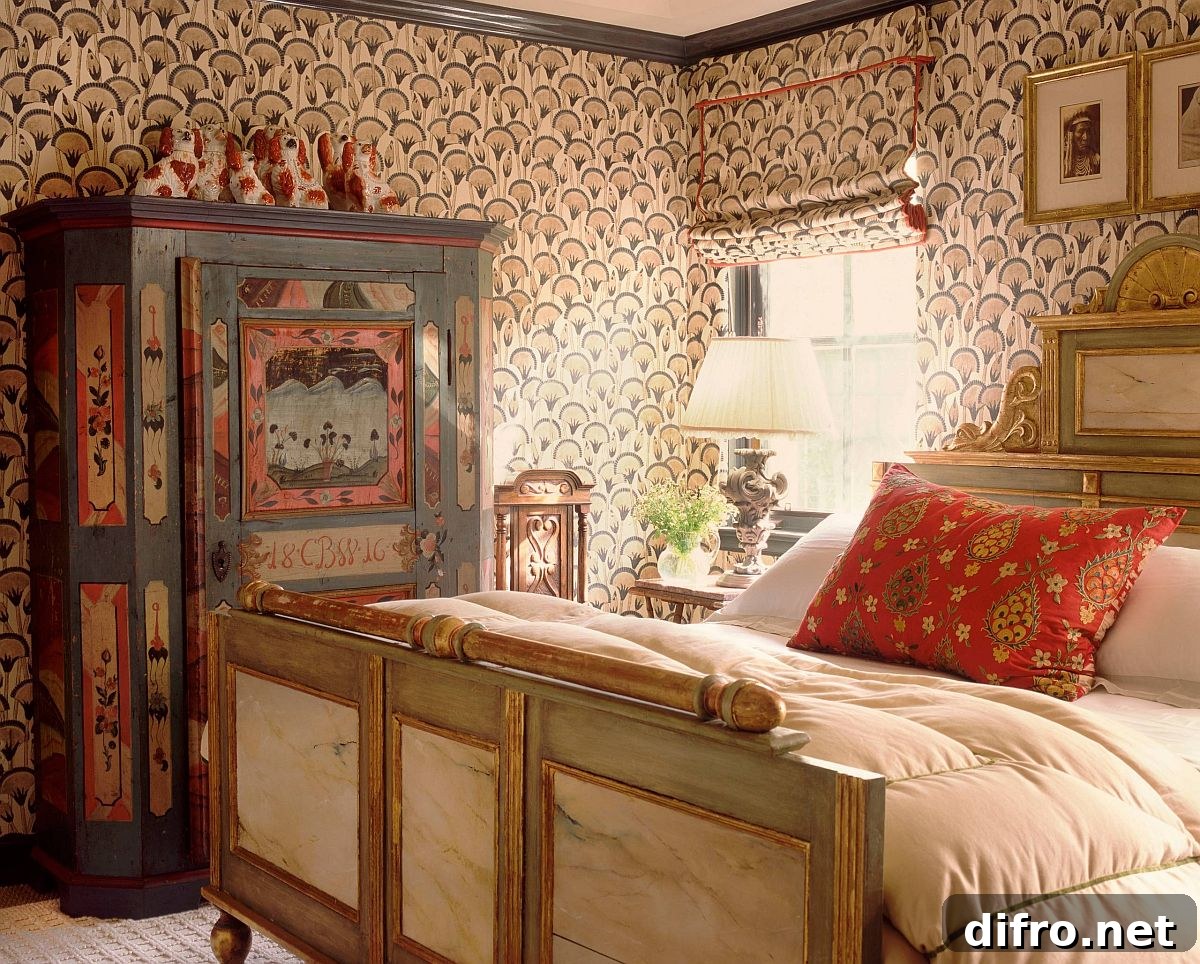 Bohemian bedroom with vintage furniture and patterned wallpaper.