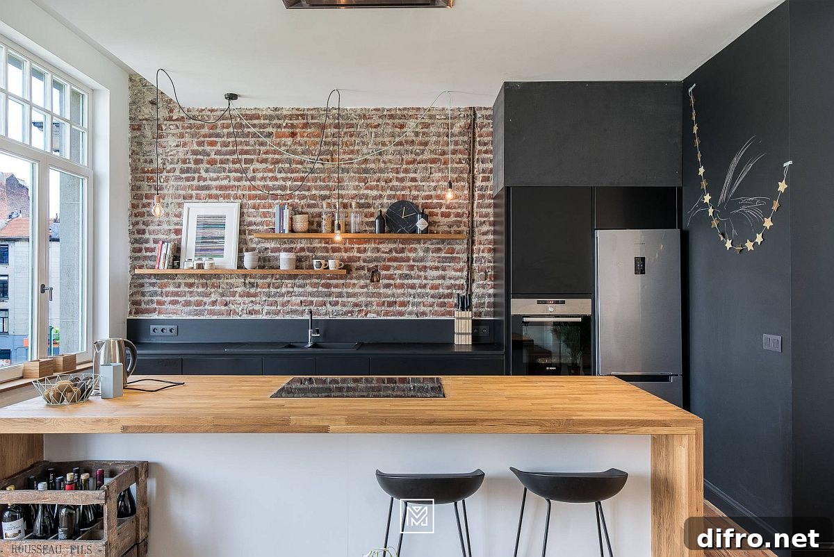 Polished gray finishes combined with exposed brick wall