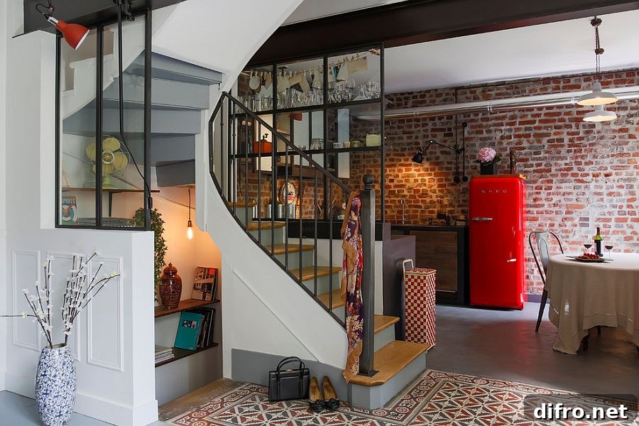 Small kitchen behind a spiral staircase