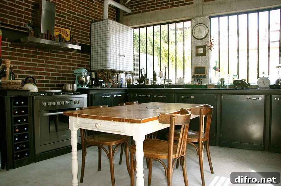 Corner space in industrial kitchen with brick backdrop
