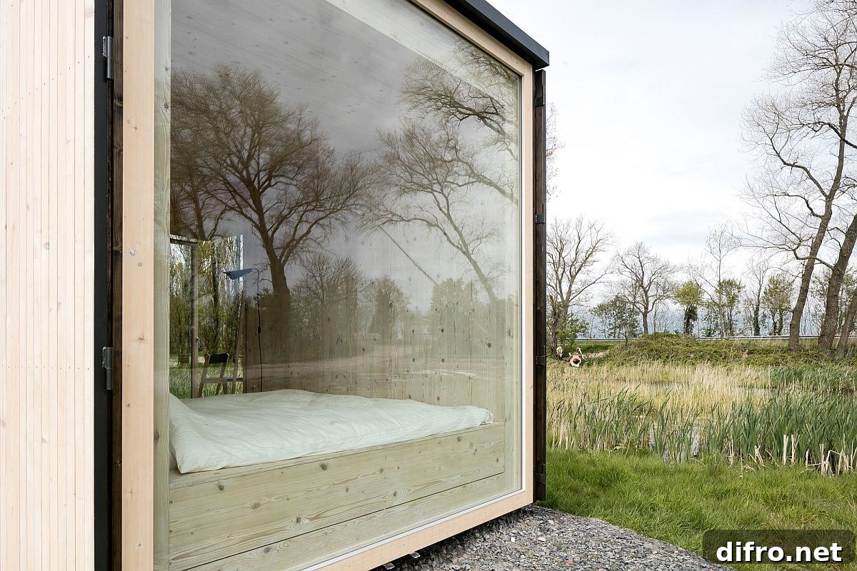 Window connecting bedroom to landscape